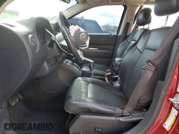 2015 Jeep Compass High Altitude with VIN 1C4NJCEA0FD400115, listed as a Copart auction lot 60698665 with 160,992 mi miles and Salvage title. Bid and sale history available at DreamBid. Image 7.