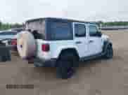 2023 Jeep Wrangler Sahara with VIN 1C4JJXP65PW555618, listed as a IAAI auction lot 43005963 with 29,146 mi miles and . Bid and sale history available at DreamBid. Image 4.