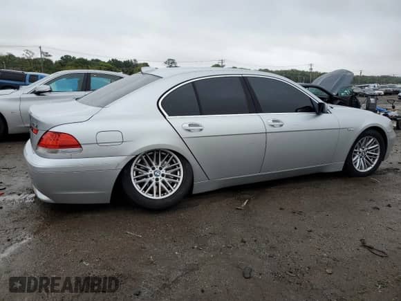 2004 BMW 7 Series 745i with VIN WBAGL634X4DP70421, listed as a Copart auction lot 73309744 with 123,457 mi miles and Salvage title. Bid and sale history available at DreamBid. Image 3.