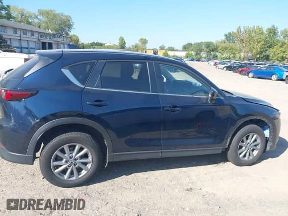 2023 Mazda CX-5 S Select с VIN JM3KFBBM7P0186107, выставлен на аукционе IAAI как лот 43287081 с пробегом 126 778 миль миль и . История ставок и продаж доступна на DreamBid. Изображение 13.
