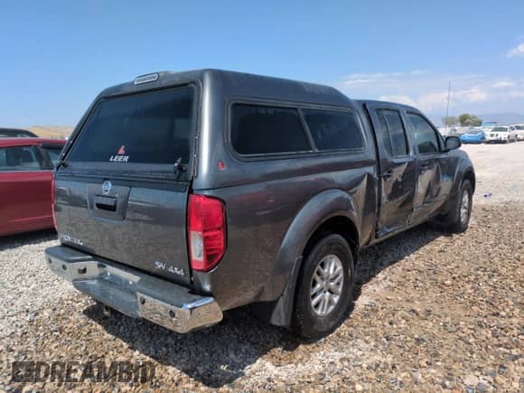 2016 Nissan Frontier SV with VIN 1N6AD0FV5GN780728, listed as a Copart auction lot 59890745 with 135,059 mi miles and Salvage title. Bid and sale history available at DreamBid. Image 3.