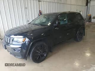 2018 Jeep Grand Cherokee Laredo with VIN 1C4RJFAG7JC214860, listed as a Copart auction lot 60838525 with 104,347 mi miles and Clean title. Bid and sale history available at DreamBid. Image 1.