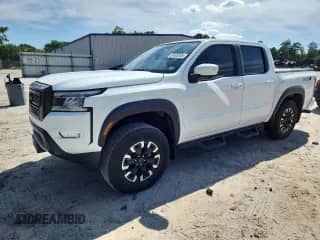 2022 Nissan Frontier Pro-X with VIN 1N6ED1EJXNN643402, listed as a Copart auction lot 67409265 with 27,378 mi miles and Salvage title. Bid and sale history available at DreamBid. Image 1.