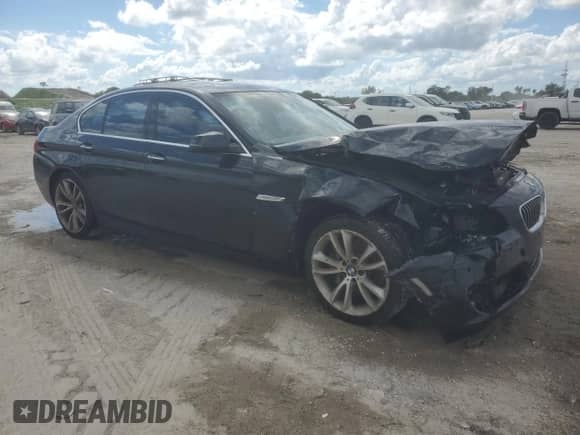 2014 BMW 5 Series 535i xDrive with VIN WBA5B3C57ED534635, listed as a Copart auction lot 82527745 with 124,954 mi miles and Clean title. Bid and sale history available at DreamBid. Image 4.