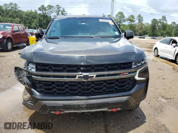 2021 Chevrolet Tahoe Z71 с VIN 1GNSKPKD0MR105450, выставлен на аукционе Copart как лот 60499915 с пробегом 102 584 миль миль и Списание • Salvage title. История ставок и продаж доступна на DreamBid. Изображение 5.