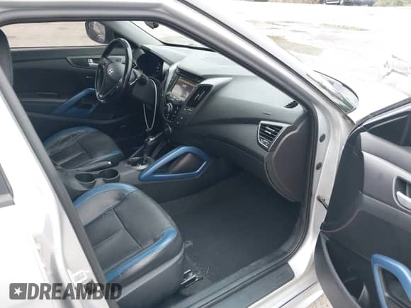 2014 Hyundai Veloster Turbo with VIN KMHTC6AE6EU206856, listed as a IAAI auction lot 42322693 with 111,716 mi miles and . Bid and sale history available at DreamBid. Image 5.