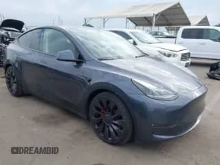 2023 Tesla Model Y Performance with VIN 7SAYGDEF2PF864243, listed as a IAAI auction lot 43259731 with 36,275 mi miles and . Bid and sale history available at DreamBid. Image 1.