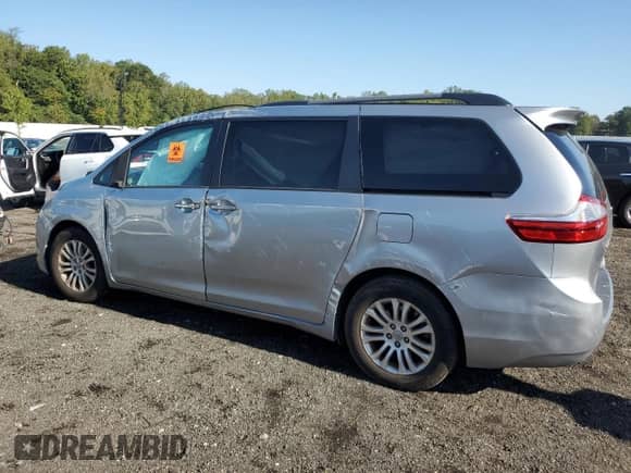 2016 Toyota Sienna XLE with VIN 5TDYK3DC3GS765844, listed as a Copart auction lot 81422995 with 55,067 mi miles and Salvage title. Bid and sale history available at DreamBid. Image 2.