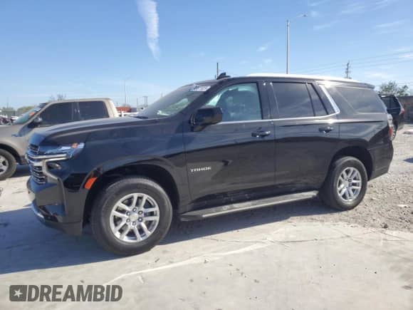 2023 Chevrolet Tahoe LT z VIN 1GNSCNKD6PR274698, wystawiony jako Copart lot #49871025 z przebiegiem 85 319 mil mil oraz Szkoda całkowita • Salvage title. Historia ofert i sprzedaży dostępna na DreamBid. Obrazek 1.