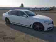 2016 BMW 7 Series 740i с VIN WBA7E2C52GG547305, выставлен на аукционе Copart как лот 80148255 с пробегом 99 952 миль миль и Чистый • Clean title. История ставок и продаж доступна на DreamBid. Изображение 4.