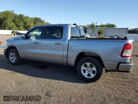 2021 Ram 1500 Big Horn with VIN 1C6SRFFT1MN573282, listed as a Copart auction lot 69461525 with 106,122 mi miles and Salvage title. Bid and sale history available at DreamBid. Image 2.