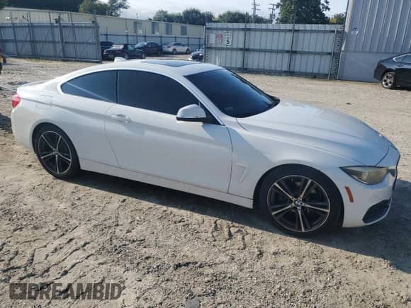 2019 BMW 4 Series 430i with VIN WBA4W3C51KAF91753, listed as a Copart auction lot 69364845 with 93,922 mi miles and Salvage title. Bid and sale history available at DreamBid. Image 4.