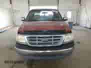 2002 Ford F-150 XLT с VIN 1FTRW07L42KC42383, выставлен на аукционе Copart как лот 67435455 с пробегом 237 921 миль миль и Списание • Salvage title. История ставок и продаж доступна на DreamBid. Изображение 5.
