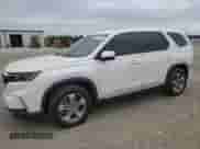 2023 Honda Pilot EX-L with VIN 5FNYG2H55PB004180, listed as a Copart auction lot 80510544 with 27,743 mi miles and Salvage title. Bid and sale history available at DreamBid. Image 1.