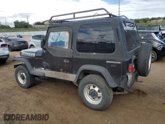 1987 Jeep Wrangler with VIN 2BCHL81J6HB505195, listed as a Copart auction lot 82144755 with 140,945 mi miles and Clean title. Bid and sale history available at DreamBid. Image 2.