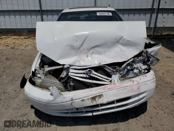 1997 Toyota Camry LE z VIN JT2BF22K5V0027518, wystawiony jako Copart lot #64042195 z przebiegiem 120 074 mil mil oraz Szkoda całkowita • Salvage title. Historia ofert i sprzedaży dostępna na DreamBid. Obrazek 5.