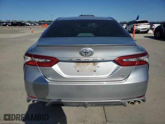 2018 Toyota Camry SE с VIN 4T1B11HK2JU002582, выставлен на аукционе Copart как лот 82613755 с пробегом 133 835 миль миль и Списание • Salvage title. История ставок и продаж доступна на DreamBid. Изображение 6.