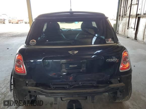 2013 MINI Hardtop S с VIN WMWSV3C54DT393182, выставлен на аукционе Copart как лот 58229265 с пробегом 59 459 миль миль и Списание • Salvage title. История ставок и продаж доступна на DreamBid. Изображение 6.