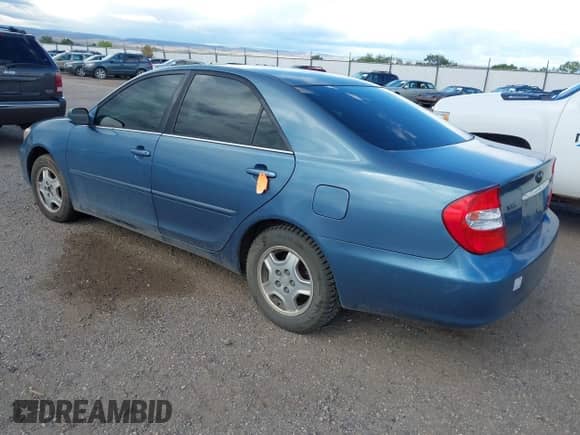 2003 Toyota Camry LE with VIN 4T1BF32K03U552842, listed as a IAAI auction lot 43221863 with 138,346 mi miles and . Bid and sale history available at DreamBid. Image 3.
