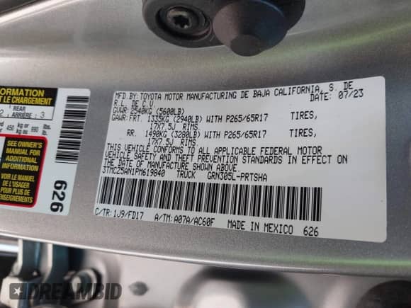 2023 Toyota Tacoma SR z VIN 3TMCZ5AN1PM619840, wystawiony jako IAAI lot #43224940 z przebiegiem 26 442 mil mil oraz . Historia ofert i sprzedaży dostępna na DreamBid. Obrazek 9.