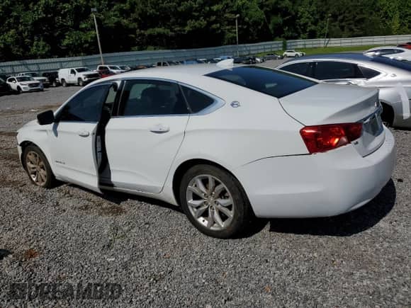 2018 Chevrolet Impala LT with VIN 2G1105S39J9148320, listed as a Copart auction lot 61401035 with 136,121 mi miles and Salvage title. Bid and sale history available at DreamBid. Image 2.