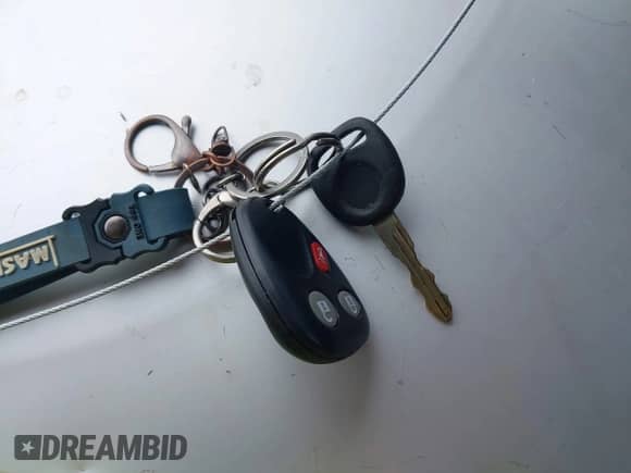 2005 Cadillac Escalade z VIN 1GYEK63N85R240601, wystawiony jako IAAI lot #43413324 z przebiegiem Nie podano mil oraz . Historia ofert i sprzedaży dostępna na DreamBid. Obrazek 11.