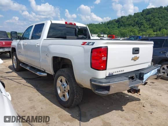 2018 Chevrolet Silverado 2500HD LT z VIN 1GC1KVEG9JF188050, wystawiony jako IAAI lot #42696983 z przebiegiem 103 599 mil mil oraz . Historia ofert i sprzedaży dostępna na DreamBid. Obrazek 3.