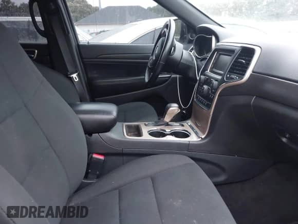 2017 Jeep Grand Cherokee Laredo with VIN 1C4RJFAG4HC648454, listed as a IAAI auction lot 43388108 with 239,972 mi miles and . Bid and sale history available at DreamBid. Image 5.