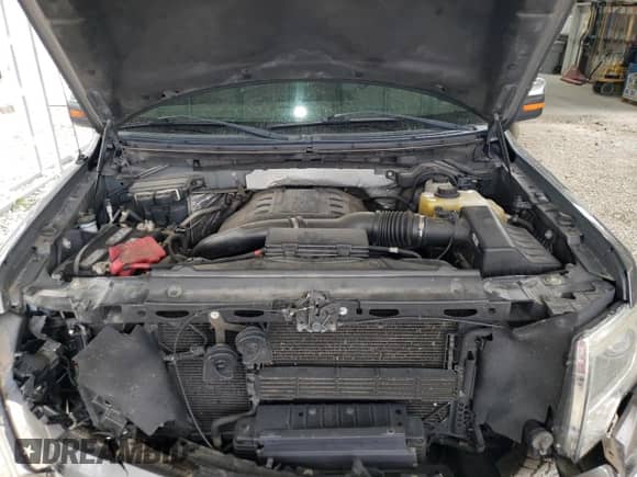 2013 Ford F-150 Lariat with VIN 1FTFW1ET2DFC87796, listed as a Copart auction lot 71112565 with 207,394 mi miles and Salvage title. Bid and sale history available at DreamBid. Image 11.