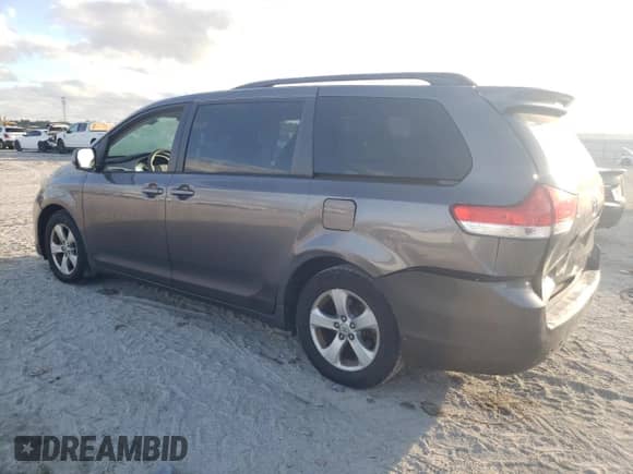 2012 Toyota Sienna LE with VIN 5TDKK3DC5CS231390, listed as a Copart auction lot 85662385 with 125,918 mi miles and Salvage title. Bid and sale history available at DreamBid. Image 2.