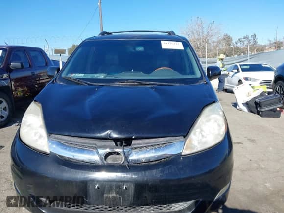 2009 Toyota Sienna XLE z VIN 5TDZK22C69S273555, wystawiony jako IAAI lot #41276221 z przebiegiem 129 160 mil mil oraz . Historia ofert i sprzedaży dostępna na DreamBid. Obrazek 12.