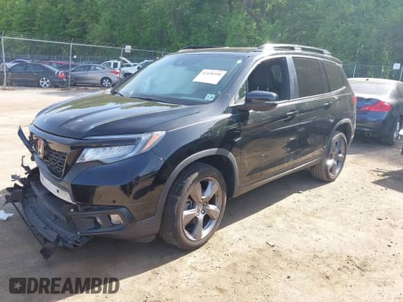 2021 Honda Passport Touring z VIN 5FNYF8H96MB014947, wystawiony jako IAAI lot #42150399 z przebiegiem 47 499 mil mil oraz . Historia ofert i sprzedaży dostępna na DreamBid. Obrazek 17.