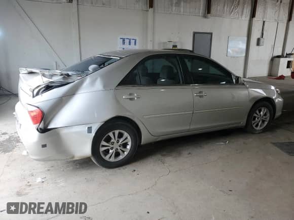 2005 Toyota Camry LE с VIN 4T1BF32K25U601915, выставлен на аукционе Copart как лот 71501335 с пробегом 127 968 миль миль и Списание • Salvage title. История ставок и продаж доступна на DreamBid. Изображение 3.