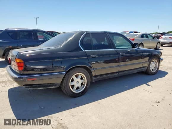 1994 BMW 7 Series с VIN WBAGD4326RDE68022, выставлен на аукционе Copart как лот 57808115 с пробегом 220 431 миль миль и Чистый • Clean title. История ставок и продаж доступна на DreamBid. Изображение 3.
