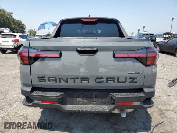 2023 Hyundai Santa Cruz SEL Premium с VIN 5NTJDDAF1PH076120, выставлен на аукционе Copart как лот 62734964 с пробегом 18 872 миль миль и Списание • Salvage title. История ставок и продаж доступна на DreamBid. Изображение 6.