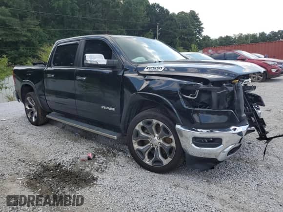 2021 Ram 1500 Laramie с VIN 1C6SRFJT3MN718913, выставлен на аукционе Copart как лот 69235235 с пробегом 115 140 миль миль и Списание • Salvage title. История ставок и продаж доступна на DreamBid. Изображение 4.