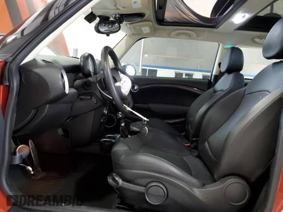 2013 MINI Hardtop S with VIN WMWSV3C52DT396176, listed as a Copart auction lot 59207165 with 104,194 mi miles and Salvage title. Bid and sale history available at DreamBid. Image 7.