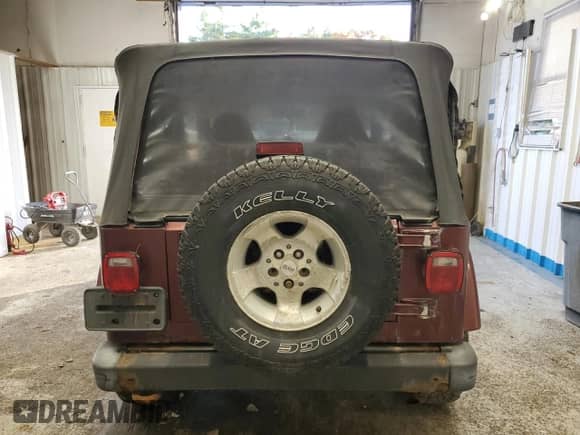 2001 Jeep Wrangler Sahara z VIN 1J4FA59S11P334534, wystawiony jako Copart lot #90651005 z przebiegiem 155 822 mil mil oraz Czysty tytuł • Clean title. Historia ofert i sprzedaży dostępna na DreamBid. Obrazek 6.