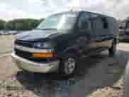 2014 Chevrolet Express Passenger LT с VIN 1GAZG1FG1E1144003, выставлен на аукционе Copart как лот 67050855 с пробегом Не указан миль и Списание • Salvage title. История ставок и продаж доступна на DreamBid. Изображение 1.