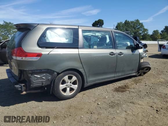 2012 Toyota Sienna with VIN 5TDZK3DC4CS184450, listed as a Copart auction lot 71284385 with 207,878 mi miles and Salvage title. Bid and sale history available at DreamBid. Image 3.