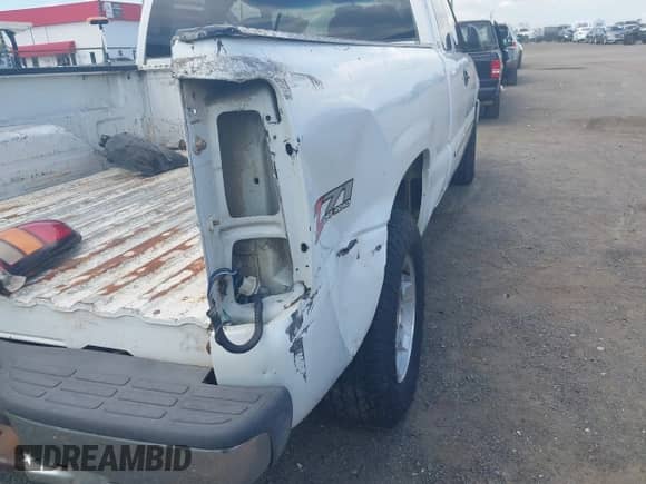 2004 GMC Sierra 1500 SLE with VIN 2GTEK19T941138584, listed as a IAAI auction lot 42862828 with 287,688 mi miles and . Bid and sale history available at DreamBid. Image 13.