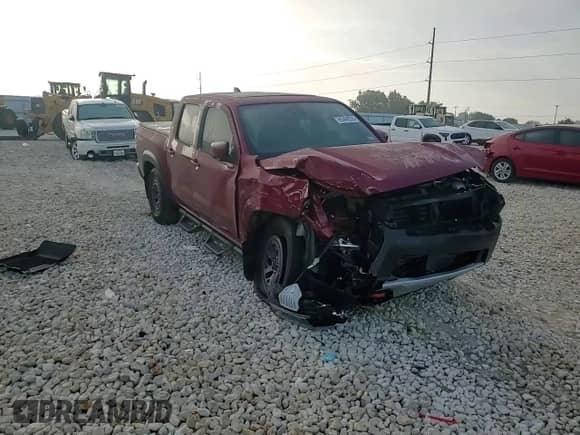 2025 Nissan Frontier Pro-X with VIN 1N6ED1EJXSN637854, listed as a Copart auction lot 65409335 with 2,410 mi miles and Salvage title. Bid and sale history available at DreamBid. Image 13.