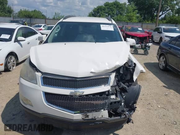 2011 Chevrolet Traverse 2LT z VIN 1GNKRJED9BJ307820, wystawiony jako IAAI lot #42713276 z przebiegiem Nie podano mil oraz . Historia ofert i sprzedaży dostępna na DreamBid. Obrazek 13.