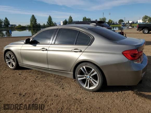 2016 BMW 3 Series 320i xDrive with VIN WBA8A3C52GK552121, listed as a Copart auction lot 69219055 with 110,811 mi miles and Salvage title. Bid and sale history available at DreamBid. Image 2.