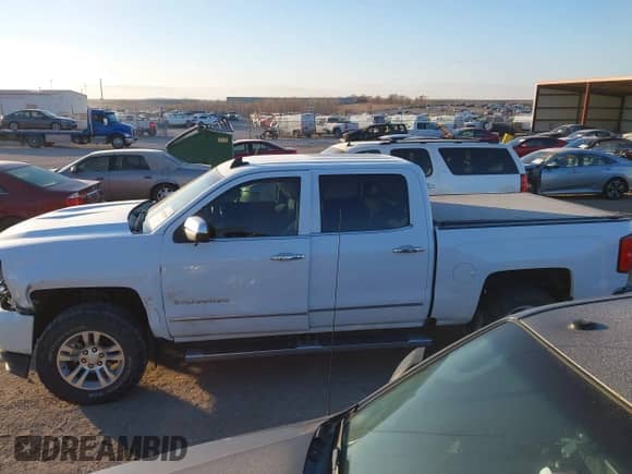 2016 Chevrolet Silverado 1500 LTZ with VIN 3GCUKSEJ2GG324890, listed as a IAAI auction lot 41141398 with 193,362 mi miles and . Bid and sale history available at DreamBid. Image 14.