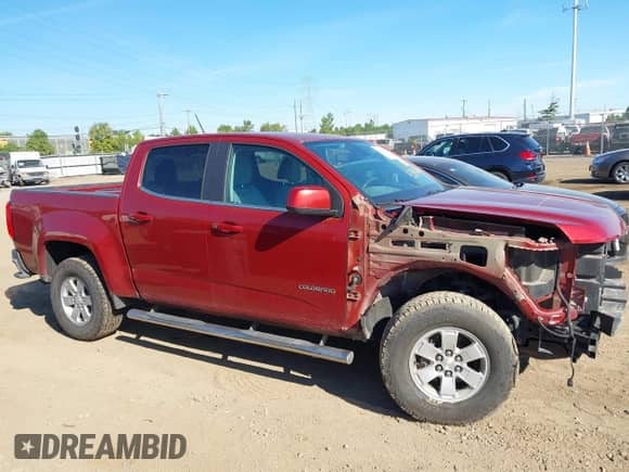 2016 Chevrolet Colorado 2WD WT z VIN 1GCGSBE38G1292427, wystawiony jako IAAI lot #43083078 z przebiegiem 68 656 mil mil oraz . Historia ofert i sprzedaży dostępna na DreamBid. Obrazek 14.