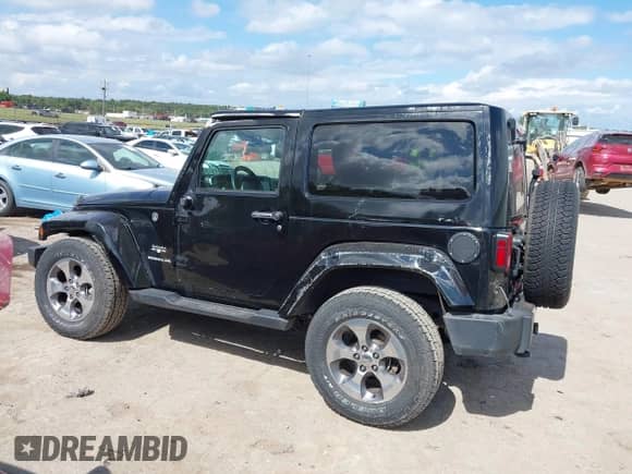 2016 Jeep Wrangler Sahara z VIN 1C4AJWBG2GL108479, wystawiony jako IAAI lot #43295339 z przebiegiem 57 237 mil mil oraz . Historia ofert i sprzedaży dostępna na DreamBid. Obrazek 15.