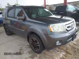 2010 Honda Pilot Touring with VIN 5FNYF3H93AB004598, listed as a IAAI auction lot 42755136 with 187,990 mi miles and . Bid and sale history available at DreamBid. Image 1.