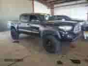 2016 Toyota Tacoma SR5 with VIN 3TMAZ5CN4GM003232, listed as a Copart auction lot 82364945 with 142,997 mi miles and Salvage title. Bid and sale history available at DreamBid. Image 4.
