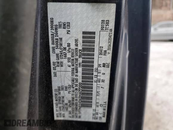 2002 Ford Econoline Cargo z VIN 1FTNE24262HA77300, wystawiony jako Copart lot #88213135 z przebiegiem 171 829 mil mil oraz Szkoda całkowita • Salvage title. Historia ofert i sprzedaży dostępna na DreamBid. Obrazek 15.